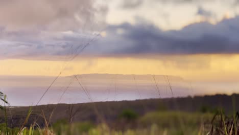 Cinematic-long-lens-shot-of-Ni'ihau,-the-Forbidden-Island,-at-sunset-off-the-coast-of-Kaua'i-in-Hawai'i