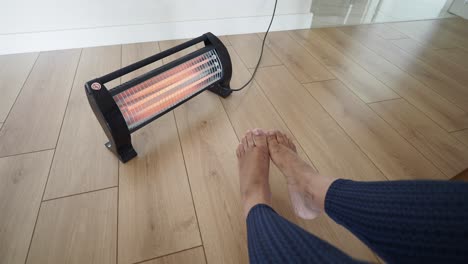 warm feet on a floor heater