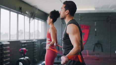 Fitness,-couple-and-skipping-with-rope-in-gym