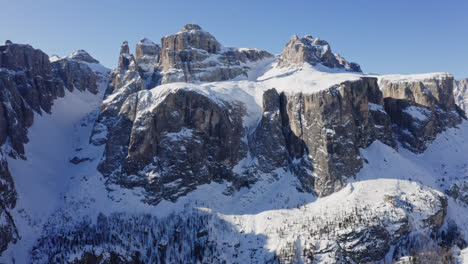 dolomites mountain range covered with snow in the province of belluno, italy