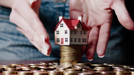 house on a stack of coins