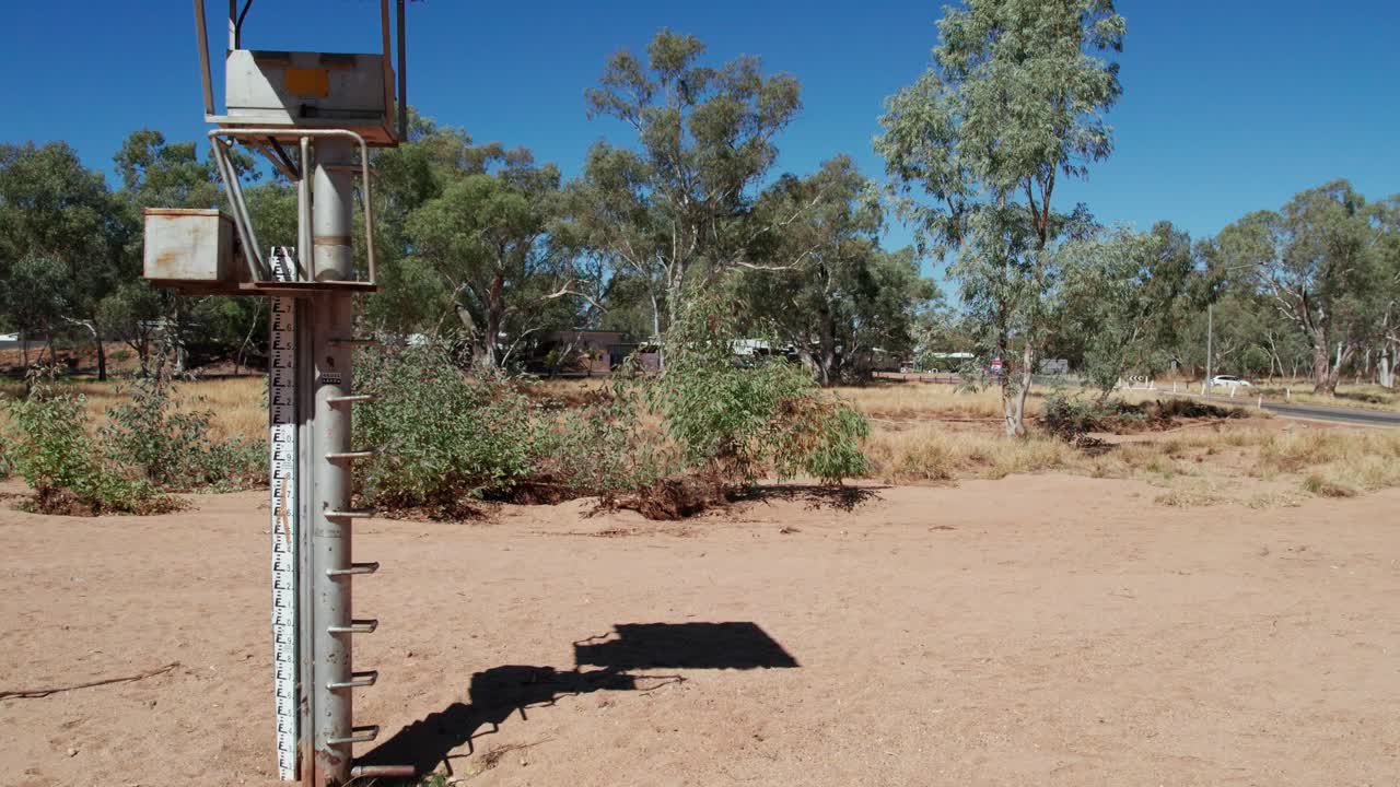 Footage panning sideways of the stream gauge on the Todd River at Heavitree Gap (station G0060126), Alice Springs, Mparntwe. Northern Territory, Australia. August 2022.