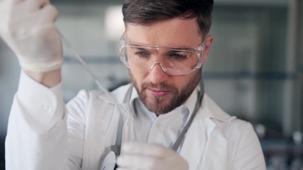 Scientist in glasses doing water research