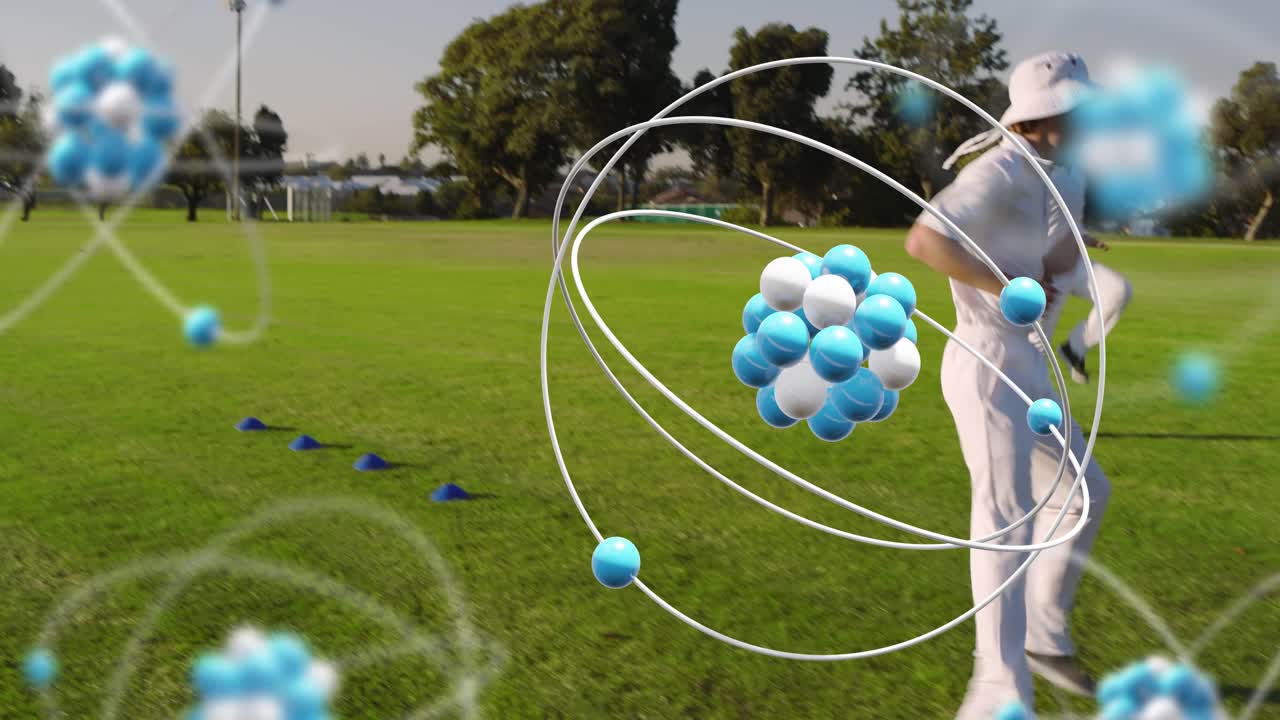 Male athletes walking onto field drilling around cones for sports with orbiting atoms near players