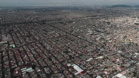 drone view of ecatepec, mexico's biggest municipality, on a cloudy afternoon