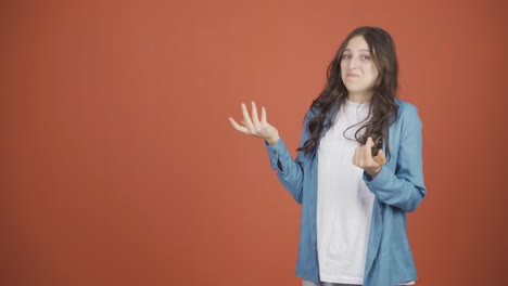 the young woman promoting is looking at the camera in surprise.