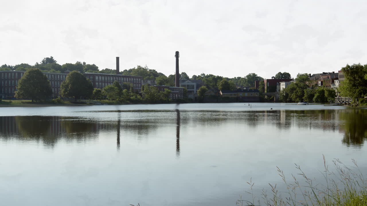 Still lake next to a colonial American town in New England