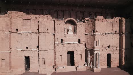 the great wall with its statue of the ancient theater of orange is open to the sky