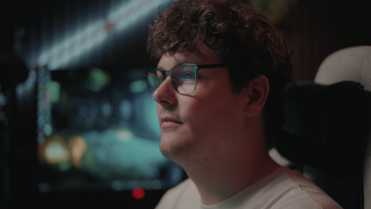 Person Concentrating on a Computer Game