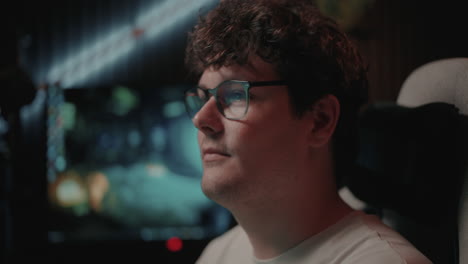person concentrating on a computer game