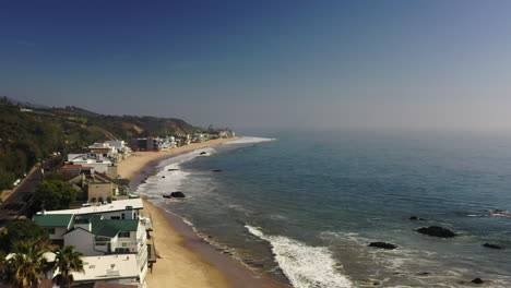 Aerial-forwarding-shot-over-scenic-Carbon-Beach-in-Malibu,-California-in-USA