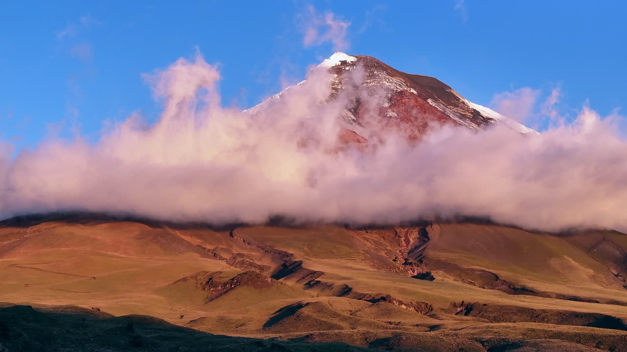Majestic Volcano Peak Shrouded in Clouds