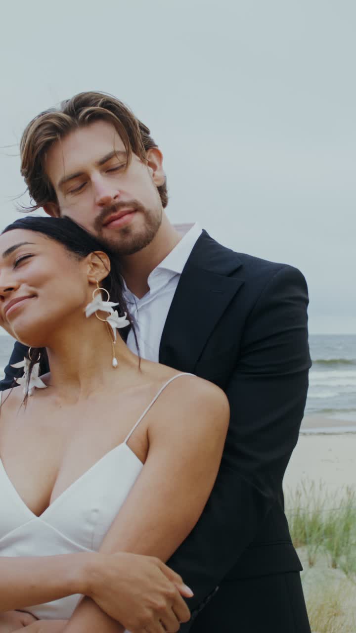Couple embracing on the beach