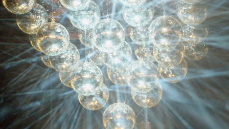 dynamic laser light show by projecting lights onto hazy mirror balls