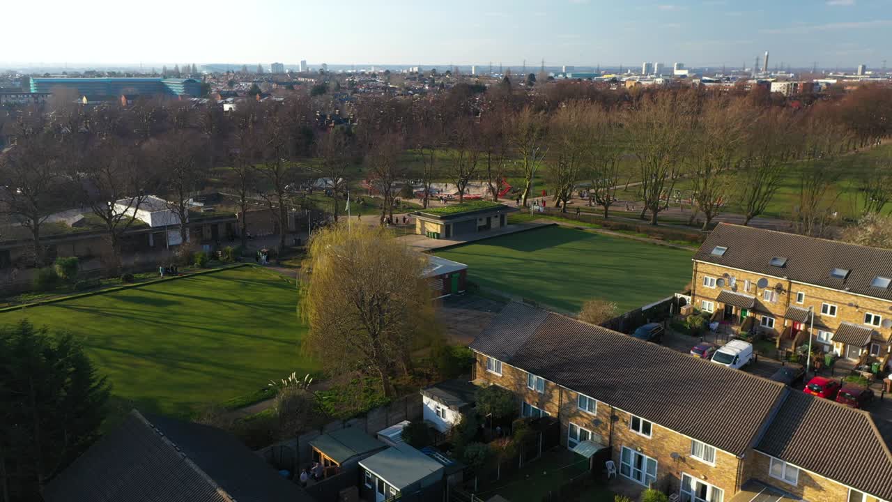 AERIAL ROTATATION VIEW OF HOME IN THE MIDDLE OF A PARK