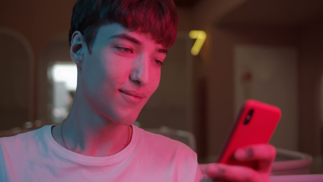 Teenager using a mobile phone