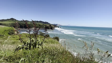 ocean waves at three sisters and the elephant beach in taranaki region of new zealand