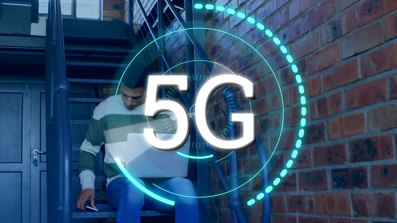 Man on the phone and laptop and 5G written in the middle of a futuristic circles 4k