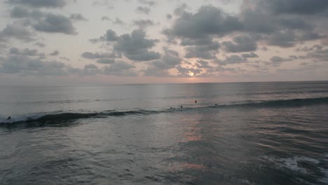 Drone-aerial-shot-of-the-waves-during-beautiful-sunset