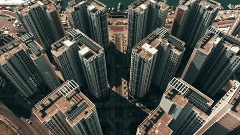 aerial view of urban high-rise apartment complex with solar panels