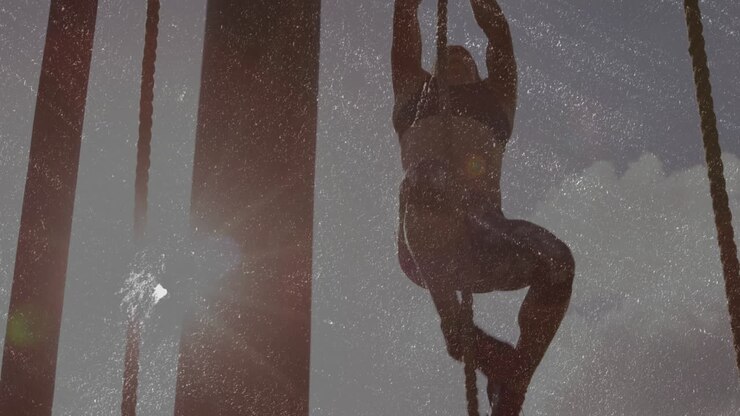 Climbing rope with sunlight and dust particles, silhouette of person in animation