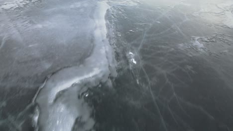 a close-up aerial view of the serene lac la hache lake in british columbia, canada