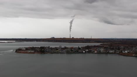 an aerial view over a marsh on a cloudy day with gray skies by freeport, ny