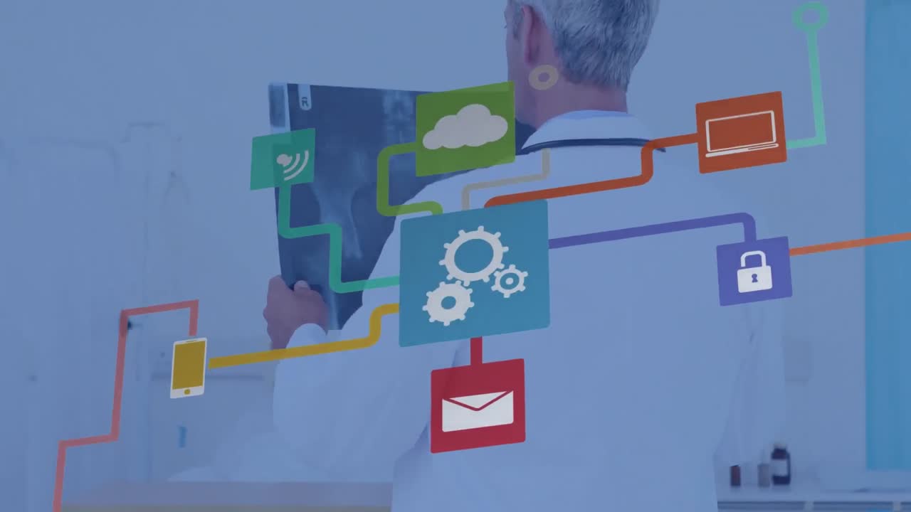 Animation of colorful flowchart with computer icons over rear view of male doctor examining x-ray