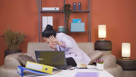 home office worker young woman looking at camera with fear and doubt.