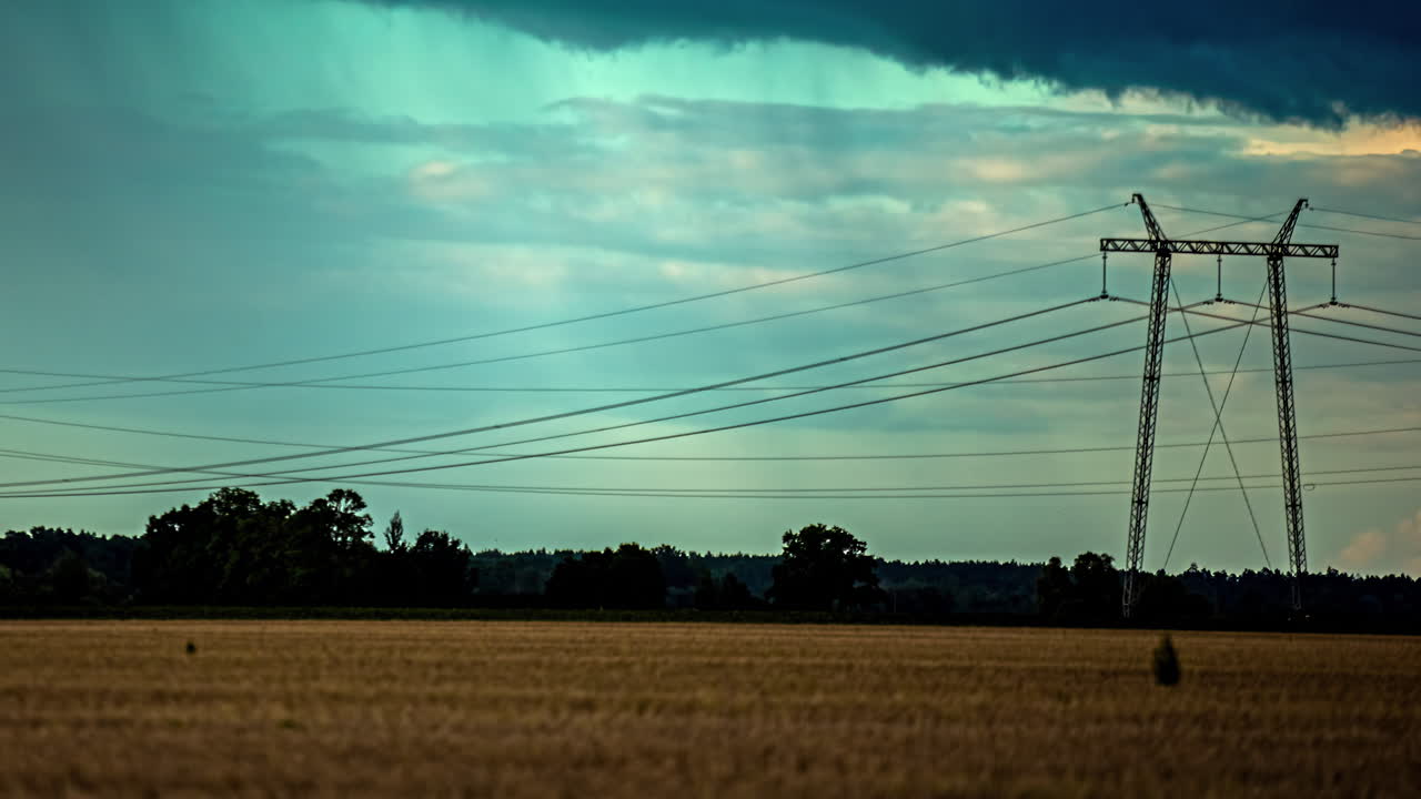 Rain shower over farmland fields - time lapse