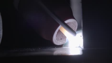 Welding Light and Sparks Close Up. Fixing Metal Connection Problem, Macro Shot