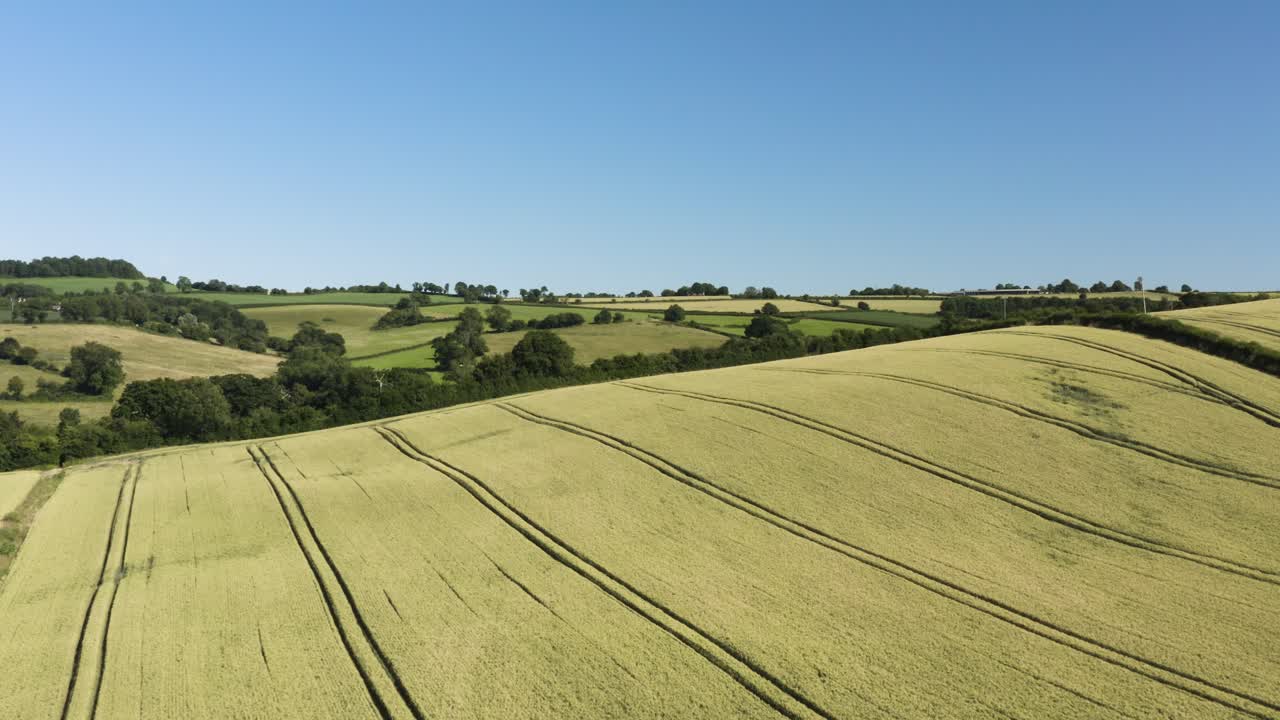 Rural Fields With Tractor Tracks On A Sunny Day In Bath, England, UK