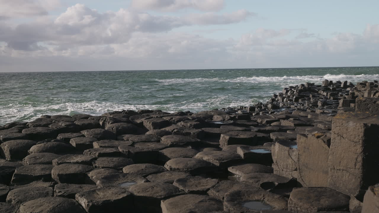 The unique hexagonal basalt rock formations at Giant's Causeway, Northern Ireland, United Kingdom, wide angle