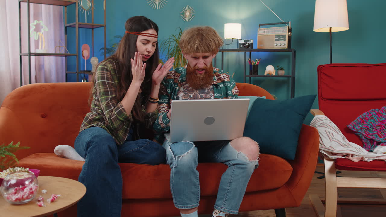 Family couple man woman use laptop surprised by bad news fortune loss fail lottery results