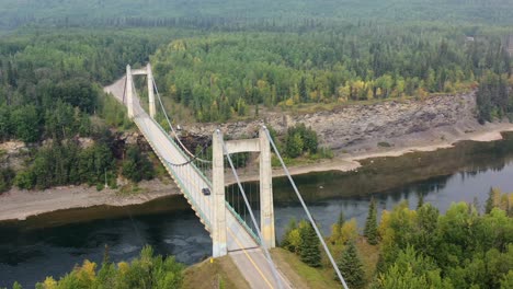 aerial footage of peace river suspension bridge in hudson hope, bc