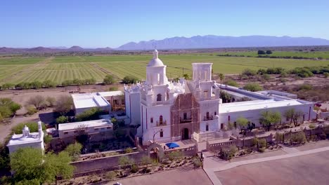 a beautiful aerial establishing shot of mission san xavier del bac a historic spanish catholic mission near tucson arizona 4