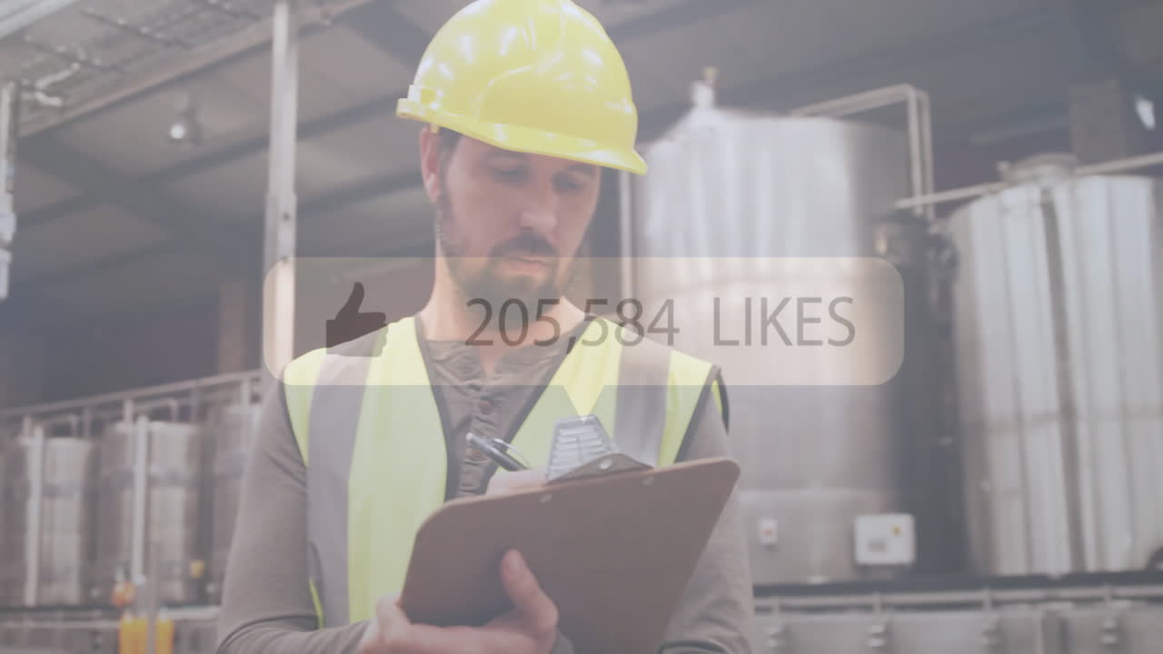Factory worker with clipboard, social media likes animation over industrial background