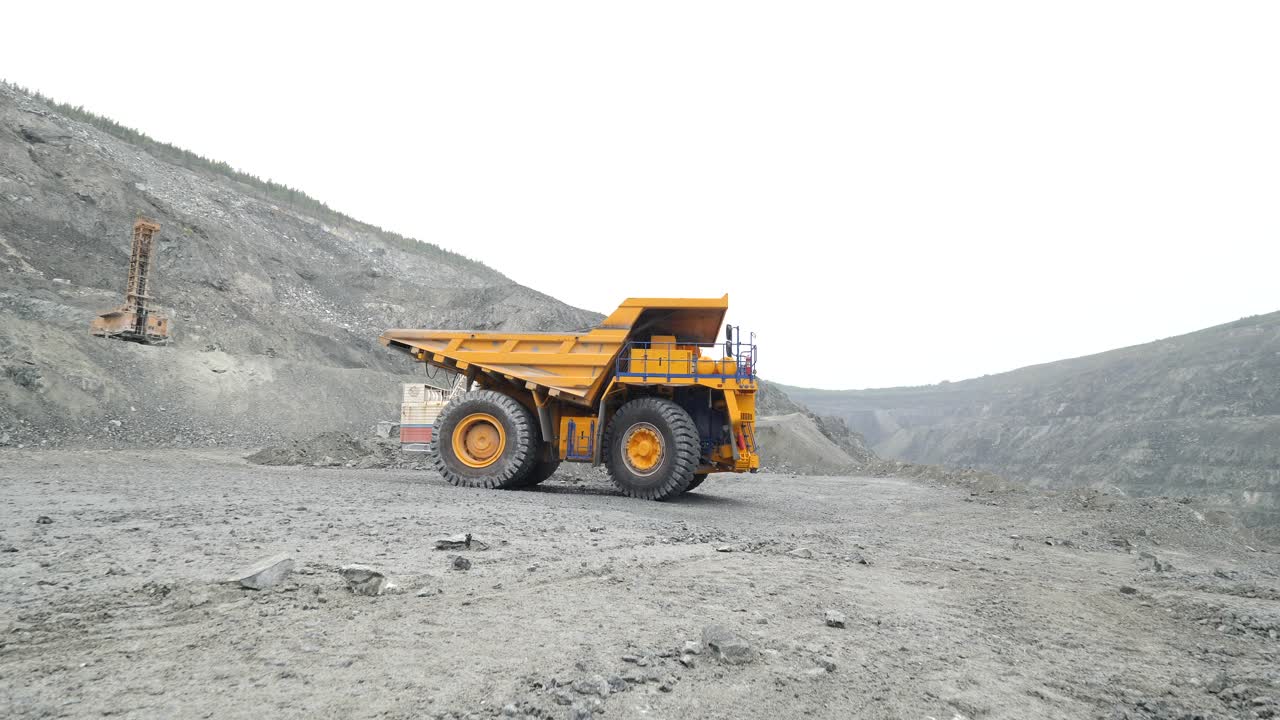 Large mining dump truck in an open-pit mine
