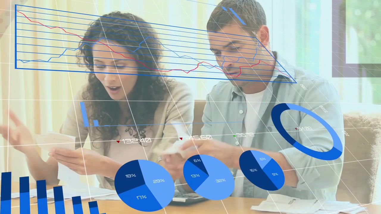Couple sitting at table sorting finance papers after spotting large charge, blue charts overlaying