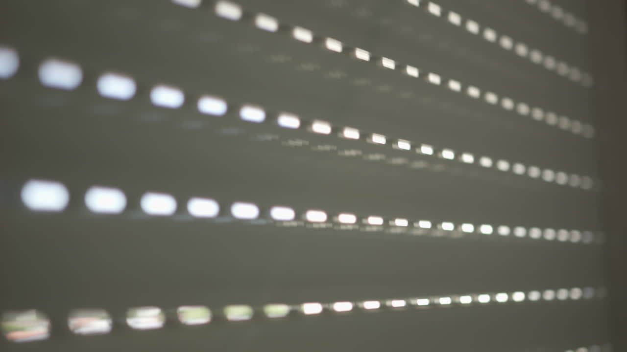 Light and Shadow Through Blinds