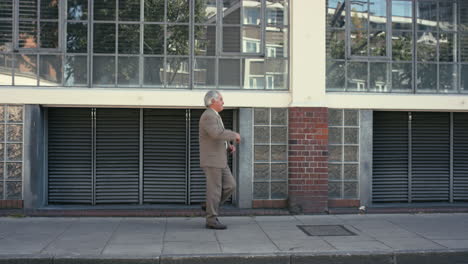 contemporary funky elderly man street dancer dancing freestyle in the city