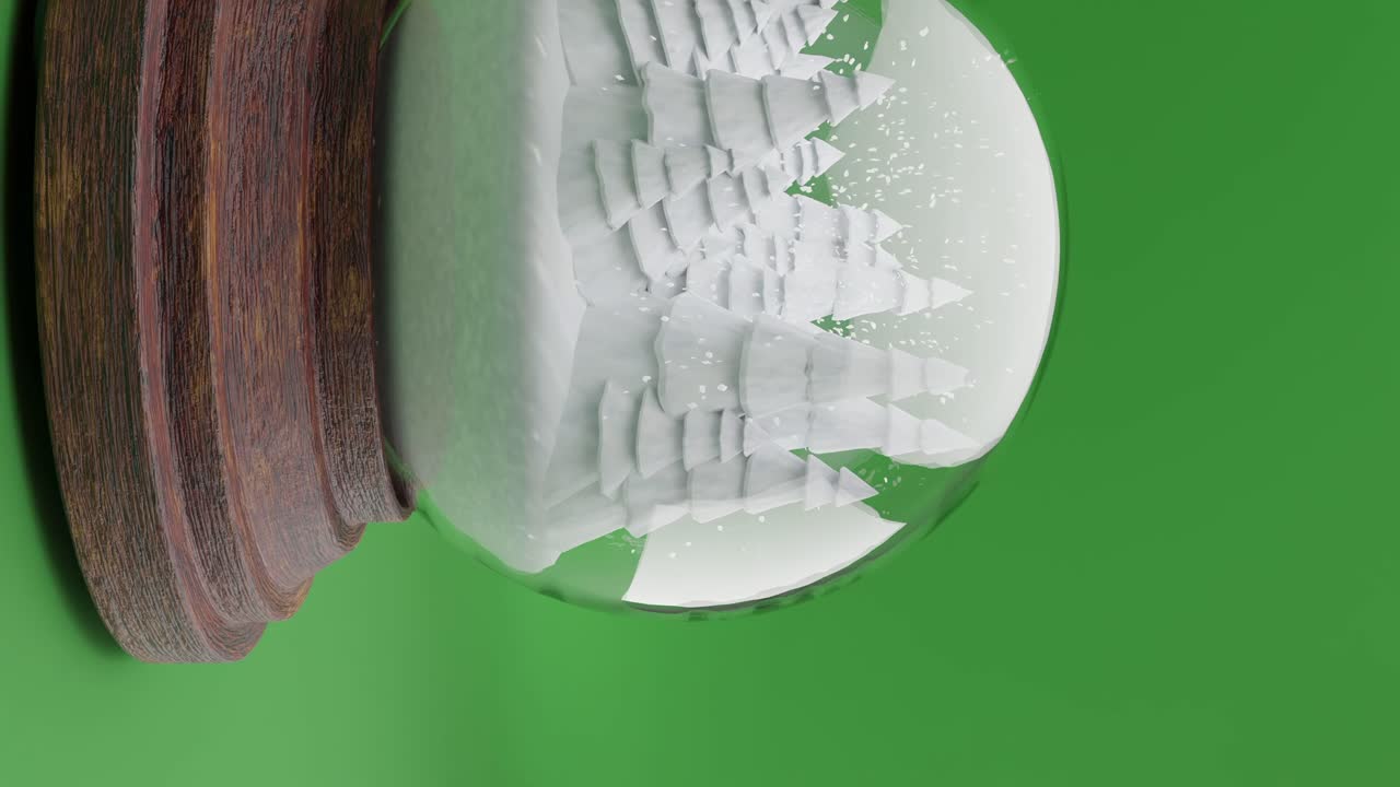 녹색 배경 세로에 스노우 글로브 내의 마법에 걸린 겨울 숲