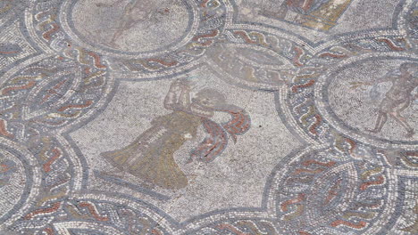 Immerse-yourself-in-the-intricate-beauty-of-ancient-tile-art-with-a-captivating-zoom-in-on-the-exquisite-ruins-of-Volubilis-in-Meknes,-Morocco