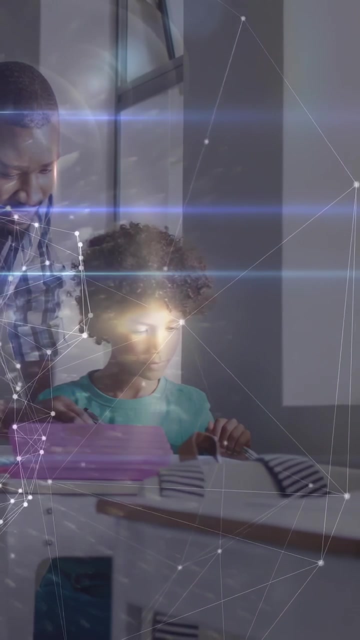 Vertical video: Man pointing paper and guiding child studying homework, net lines lighting face