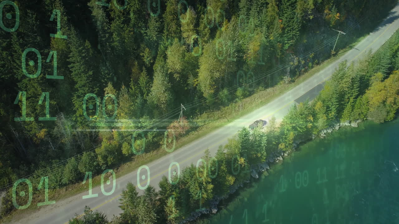 Car driving on forest road with digital binary code overlay animation