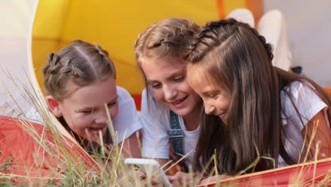Girls Having Fun in a Tent