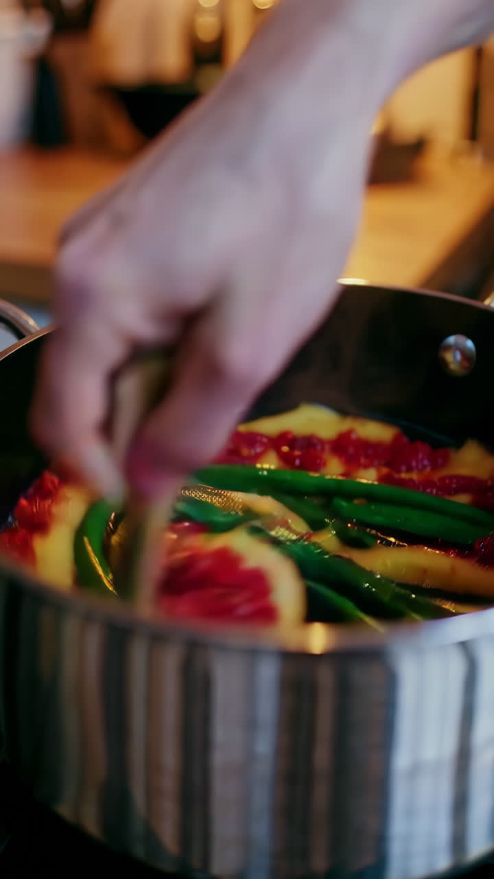 Stirring Food in a Pot While Cooking