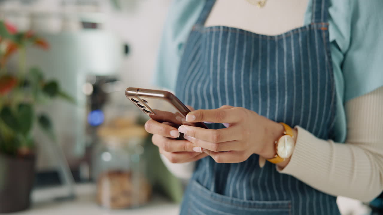 Woman using smartphone at cafe