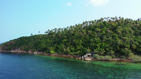 beautiful-aerial-panorama-of-the-tropical-island-with-palms-and-white-sand-beach,-perfectly-clean-turquoise-sea-water