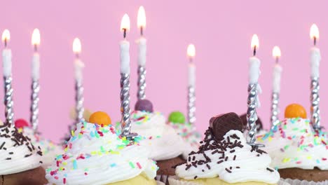 burning candles on cupcakes for birthday party